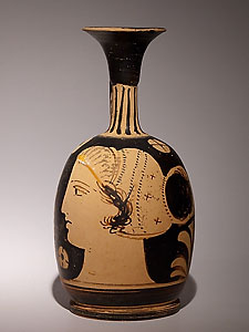 Campanian lekythos decorated with a female head - Painted terracotta
