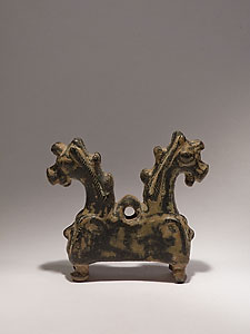 Luristan (?) pendant in the form of two protomes of foals - Bronze