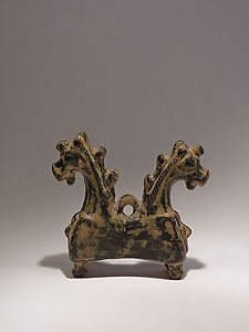 Luristan (?) pendant in the form of two protomes of foals - Bronze