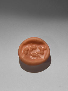 Seal-amulet in form of a lying fox - Banded agate