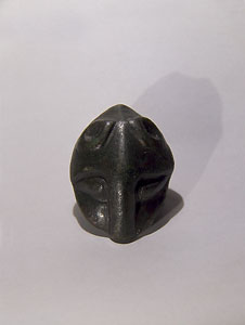 Scythian harness ornament in form of feline head - Bronze