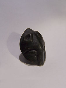 Scythian harness ornament in form of feline head - Bronze
