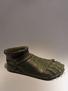 Right foot wearing a sandal - Bronze