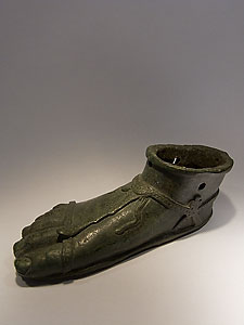 Right foot wearing a sandal - Bronze