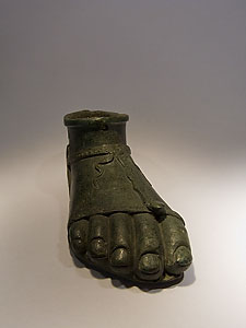 Right foot wearing a sandal - Bronze