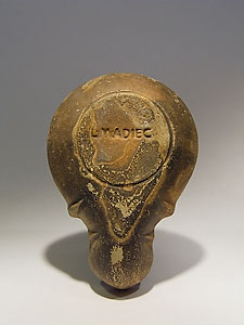 Oil lamp decorated with two tightrope walkers dwarfs - Terracotta