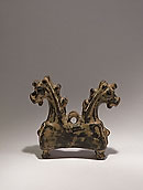 Luristan (?) pendant in the form of two protomes of foals - Bronze