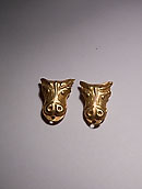 Paire de perles en forme de têtes de taureau - Or