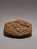 Sumerian seal depicting a lion crushing a gazelle - Pink marble