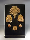 Ensemble de quatre palmettes et deux boutons - Terre cuite