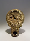 Lampe à huile ornée de deux nains équilibristes - Terre cuite