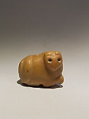 Seal-amulet in the form of a recumbent lioness - Pink calcite